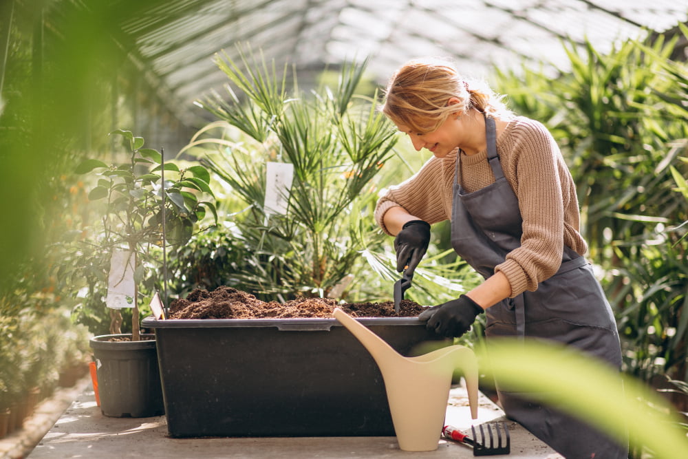 woman gardner greenhouse